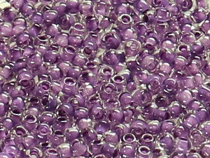 TOHO Round Beads 11/0 - 935 Purple-Lined Crystal (50g Vorteilspack)